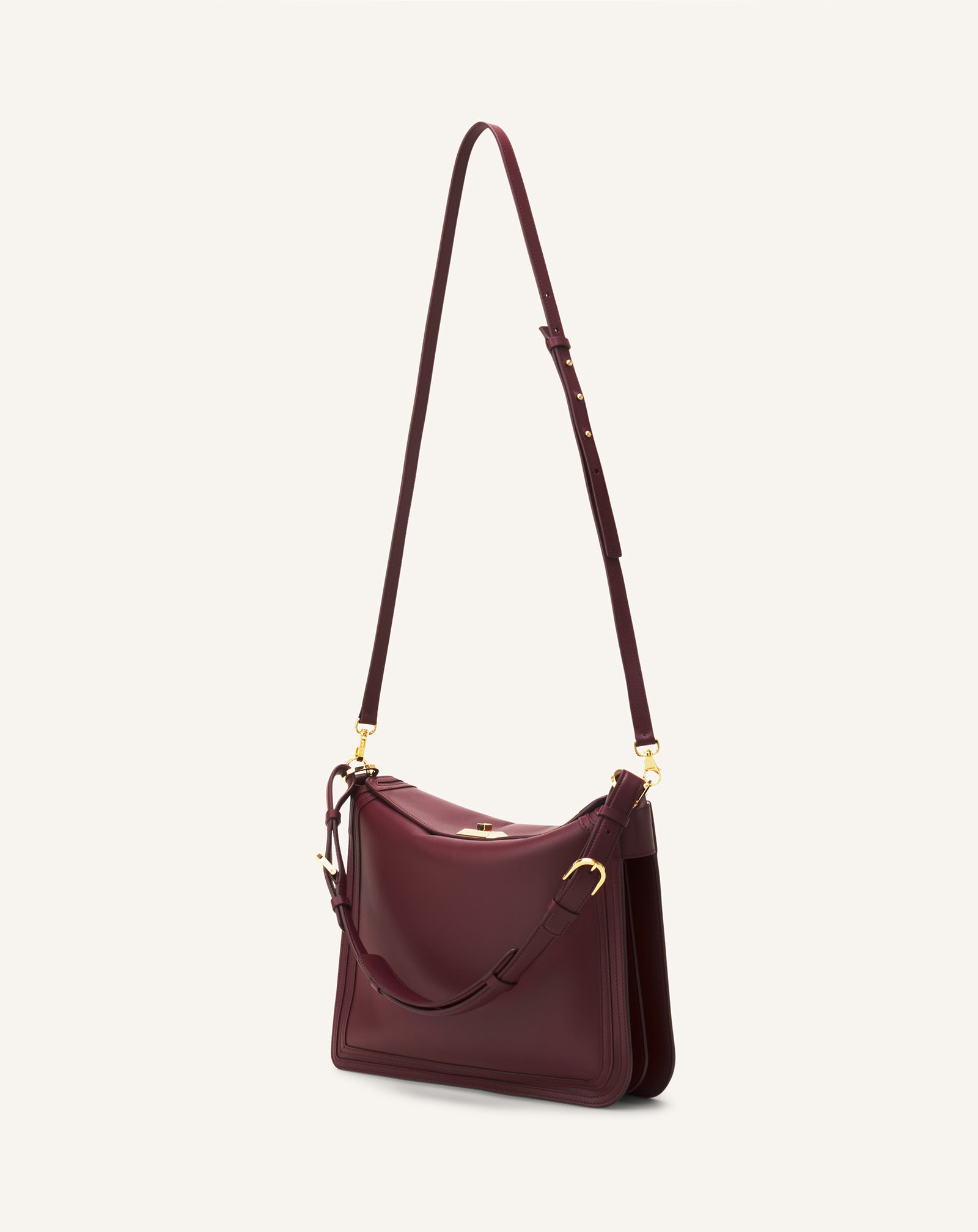 ASYMMETRICAL LEATHER COMPAGNON BAG