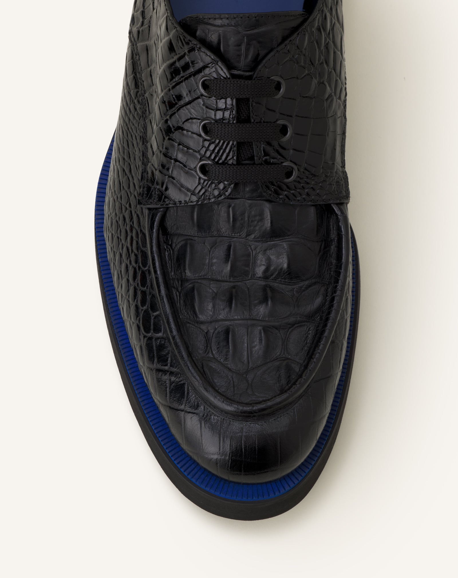 BLACK DERBY SHOES IN CROCODILE-EMBOSSED LEATHER