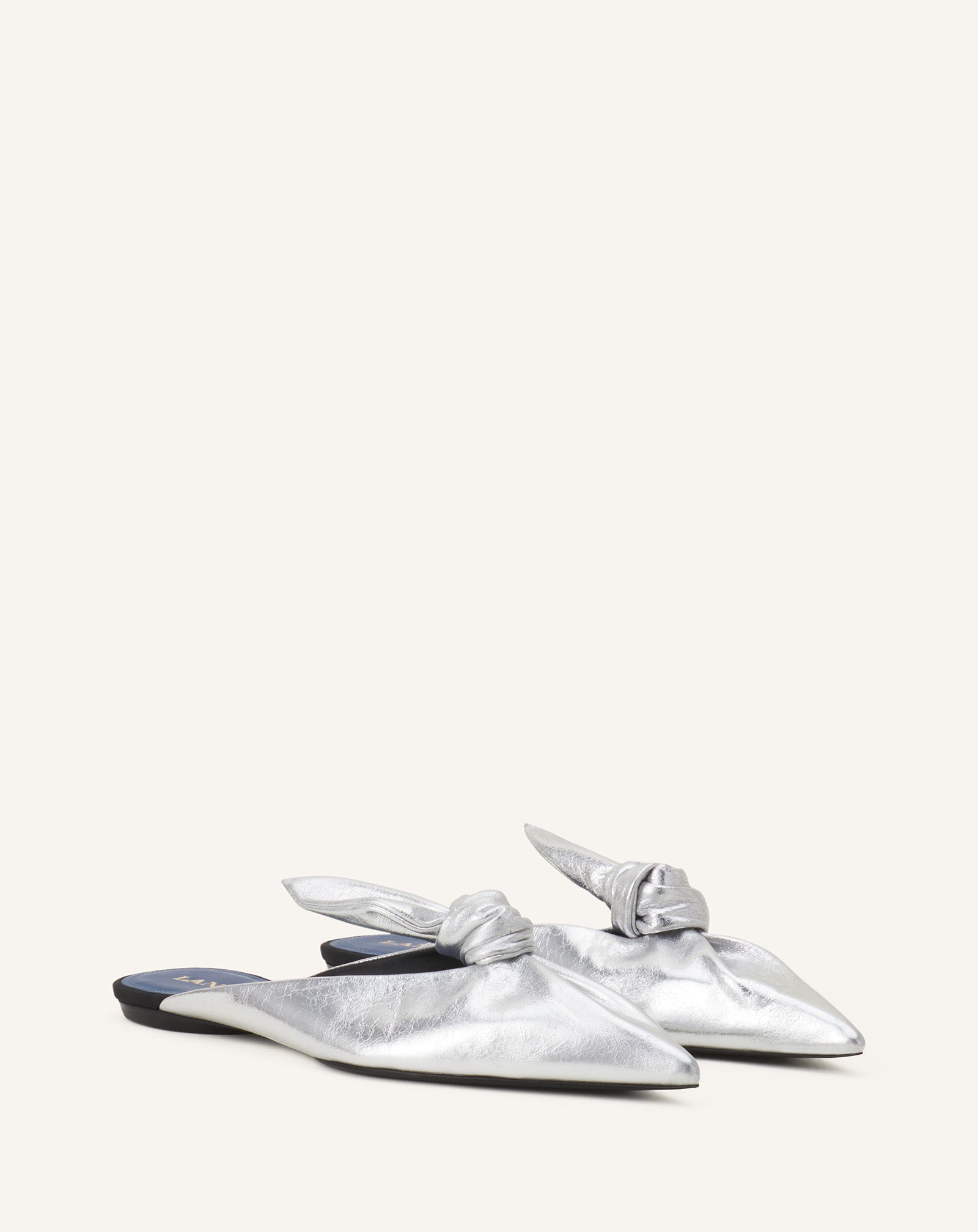 MIDNIGHT STEP BOW MULE IN METALLIC LEATHER