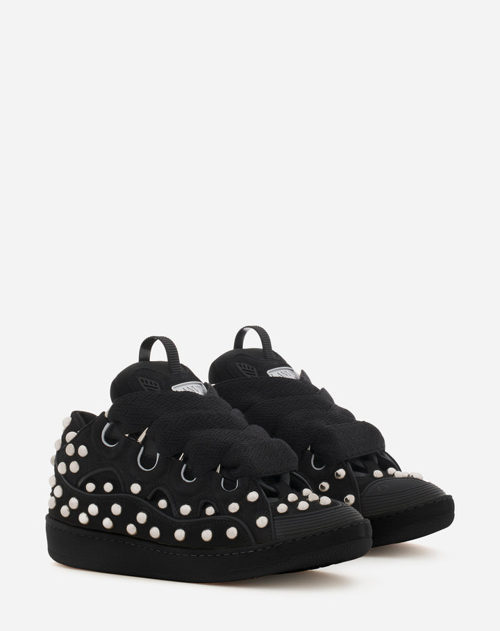 Studded leather curb sneakers