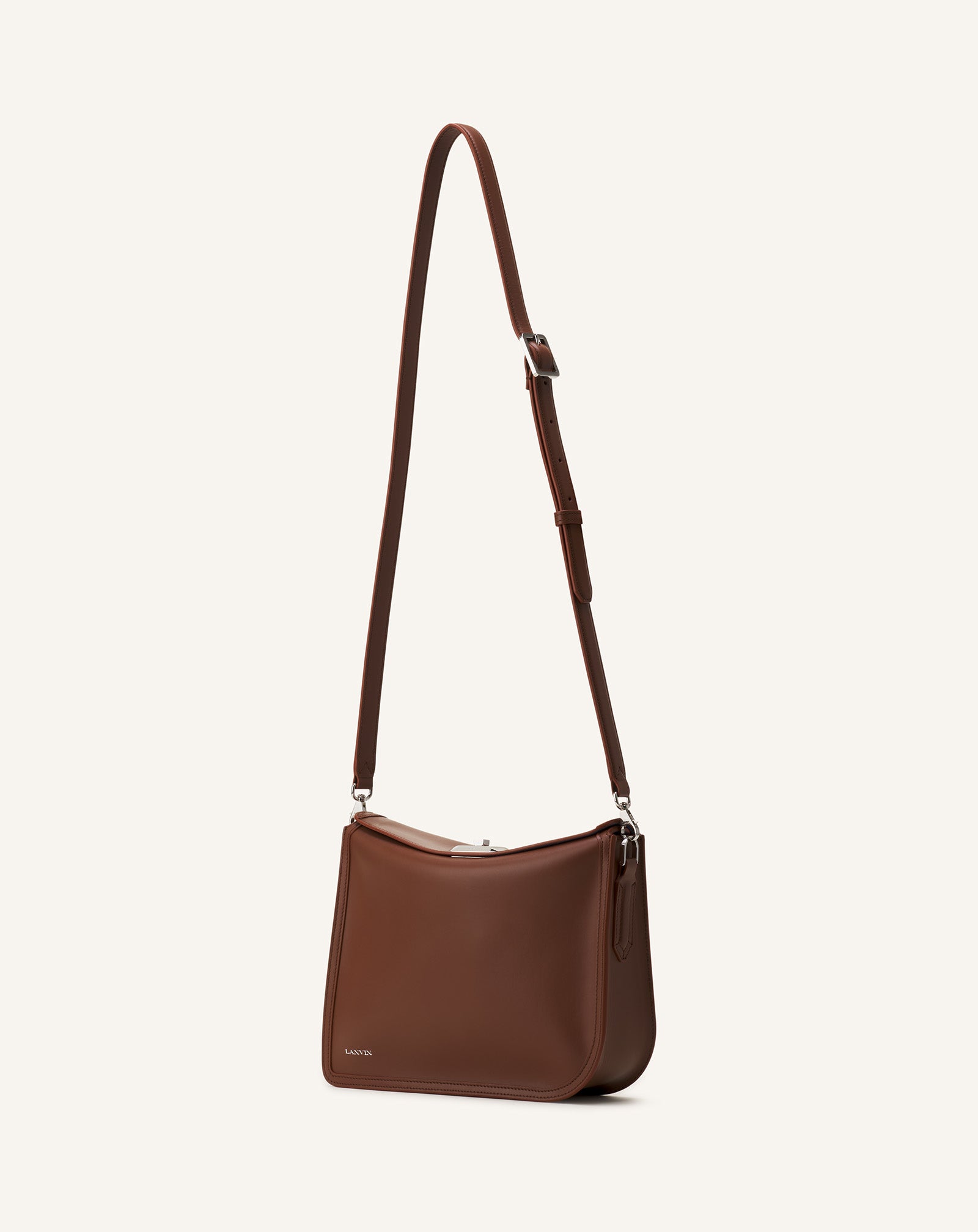 COMPAGNON ASYMMETRICAL LEATHER CLUTCH BAG