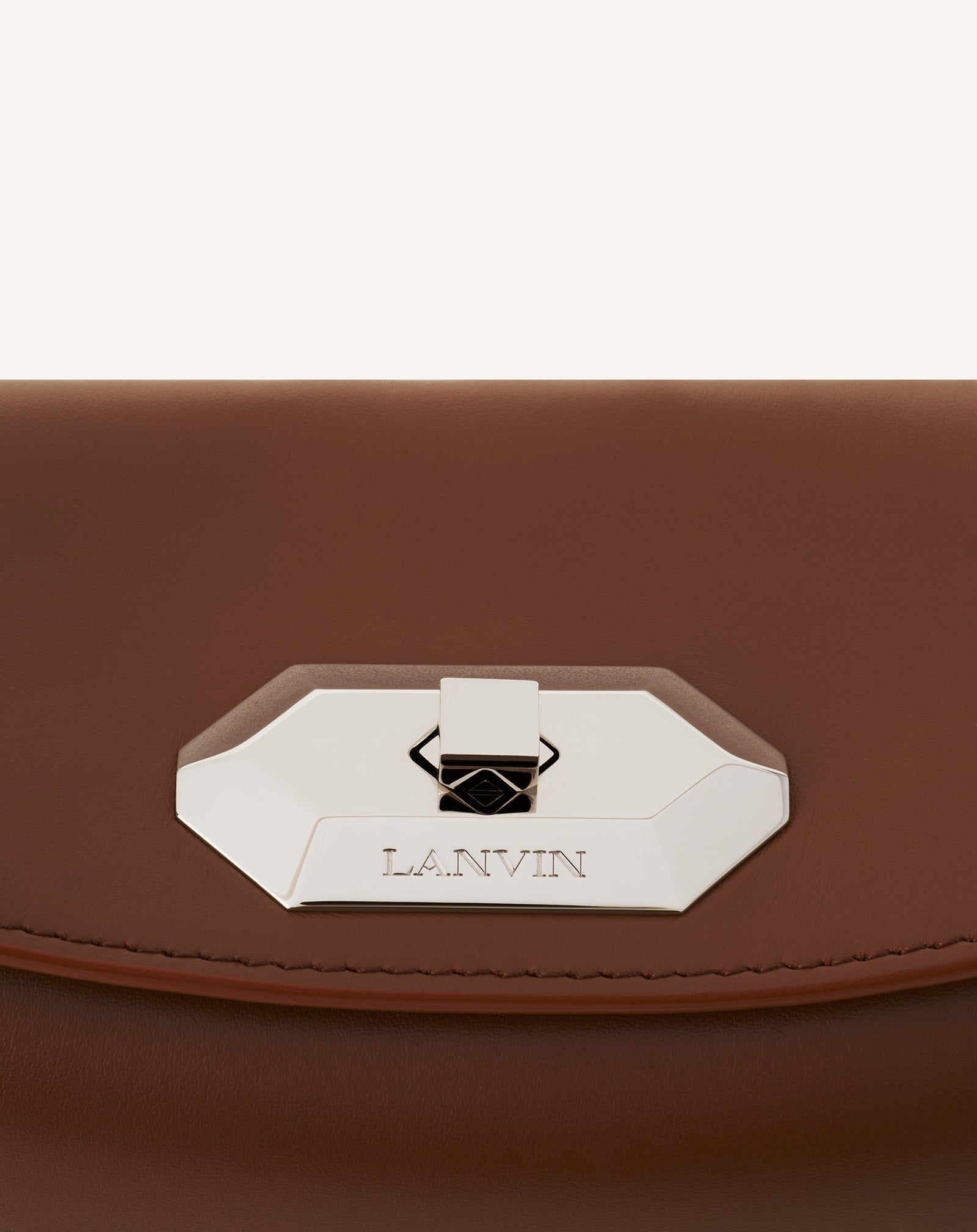 COMPAGNON ASYMMETRICAL LEATHER CLUTCH BAG