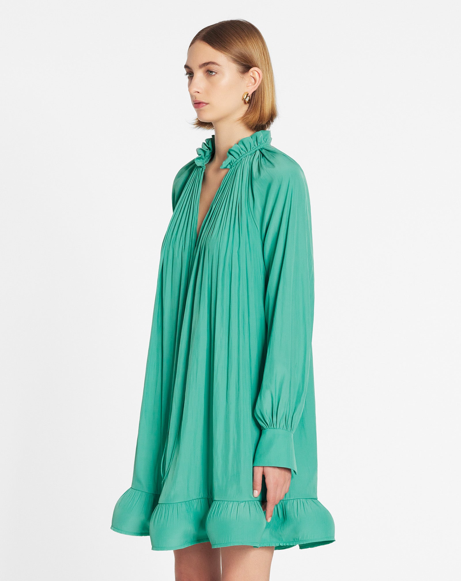 Short charmeuse dress with long sleeves and ruffles